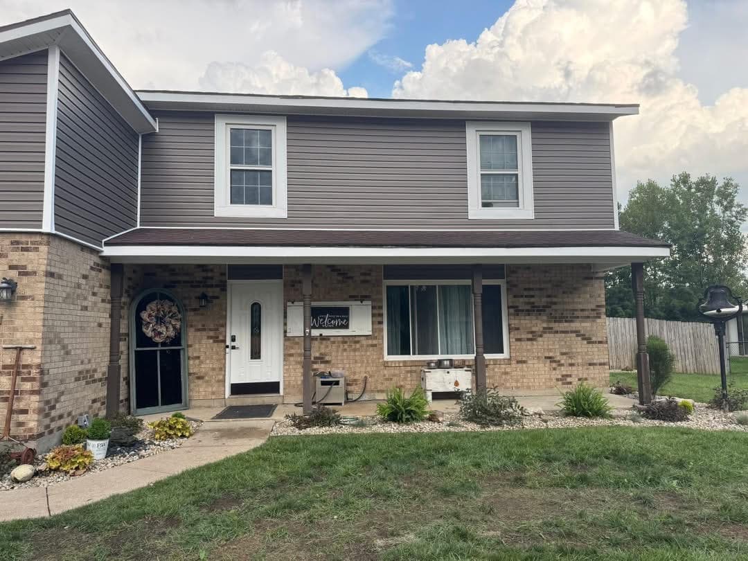 Completed siding installation on a two story home by 937 Precision in Dayton Ohio